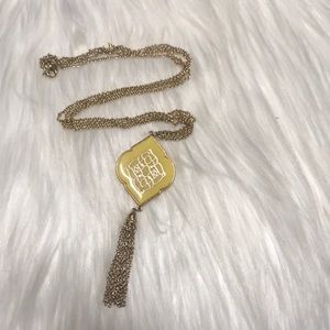 Long gold necklace